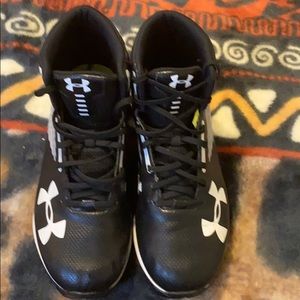 Black and white football cleats